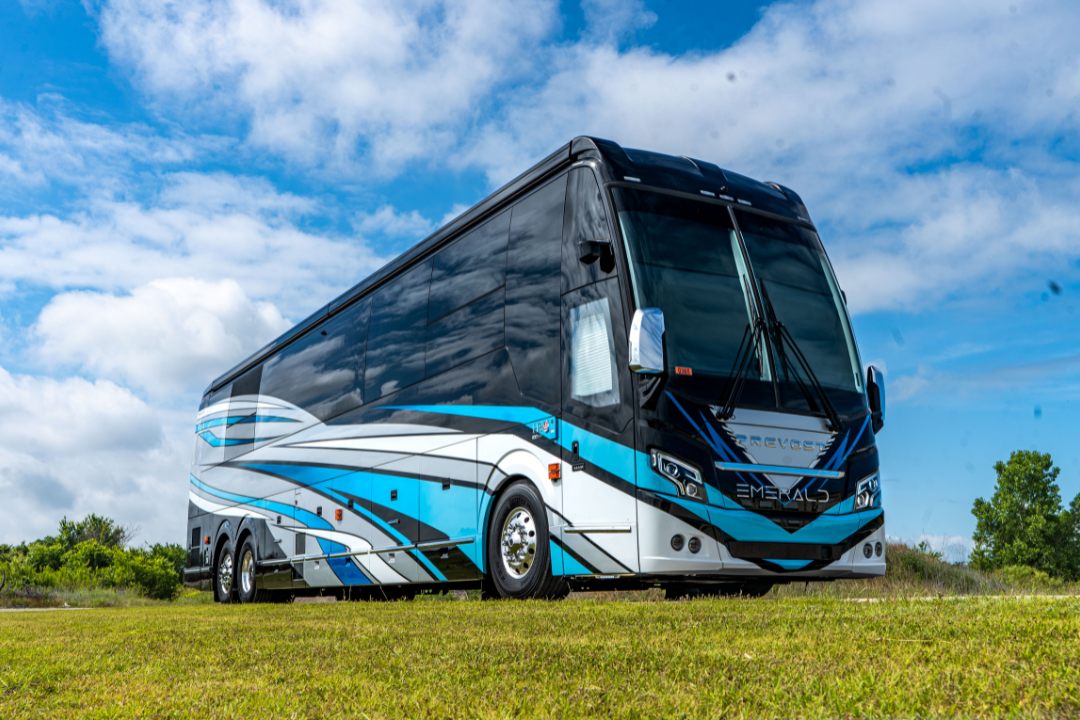 An Emerald Luxury Coaches motorhome on a Prevost shell, front three-quarter view
