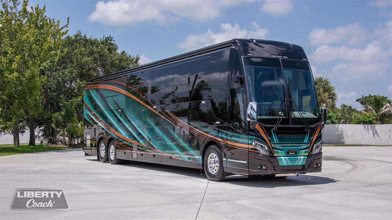 A 2027 Liberty Coach Elegant Lady on a Prevost shell, front three-quarter view